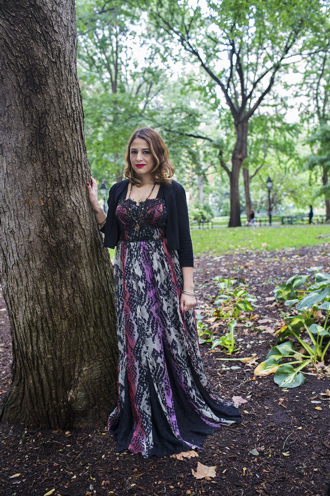 Natalie Reyes, owner of Skeleton Key Shop, poses for a portrait in Washington Square Park during the Pagan Pride Festival on Saturday, October 1, 2016. Reyes says, “It’s about being in tune with the world around you and the natural cycles of the world – seasonal changes, energetic shifts and intuition. That sums up witchcraft to me, it doesn’t necessarily mean casting spells.”<br>